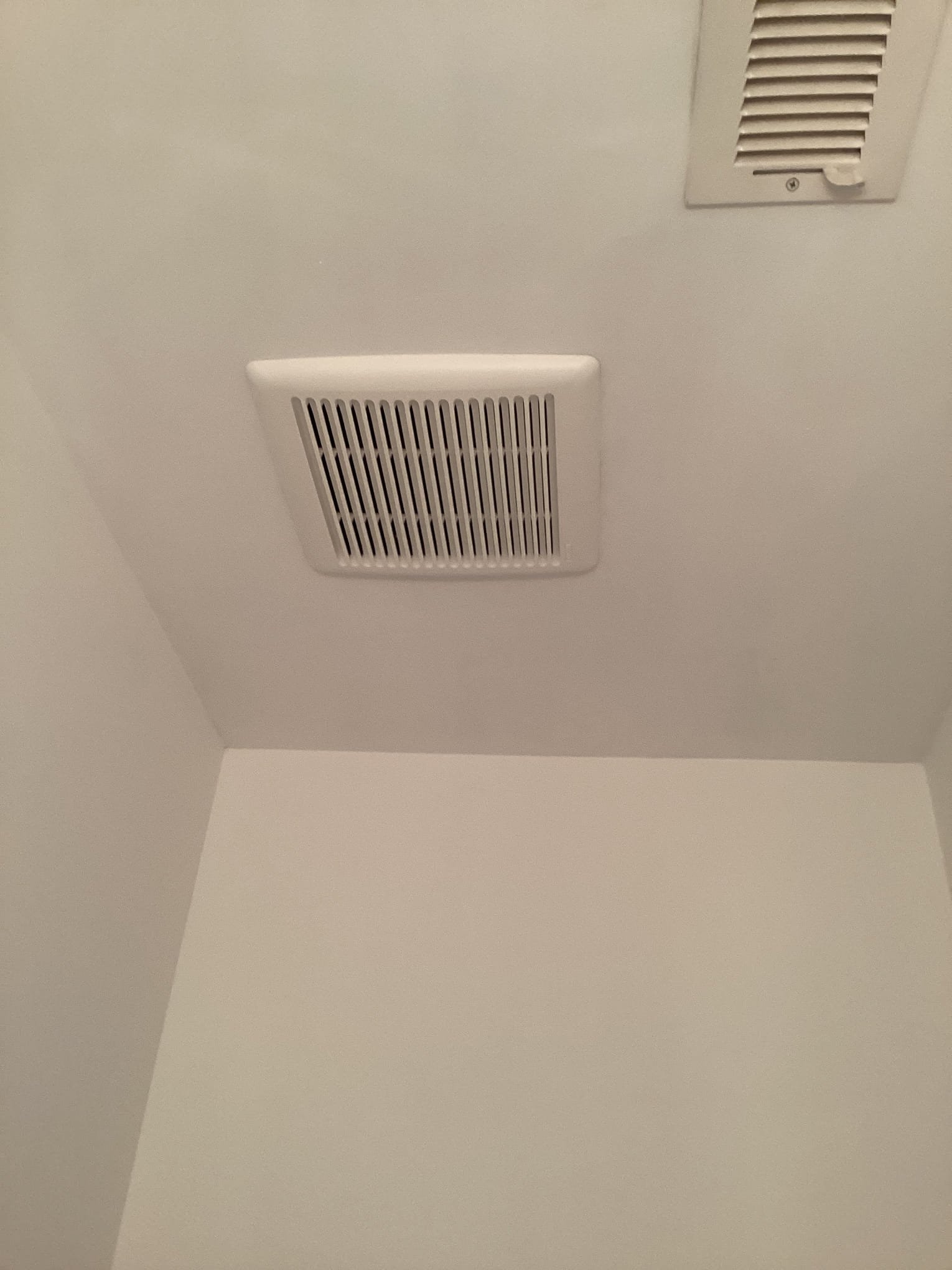 Bathroom Light & Exhaust Fan Installation in Mooresville, NC completed by Touchstone Electric