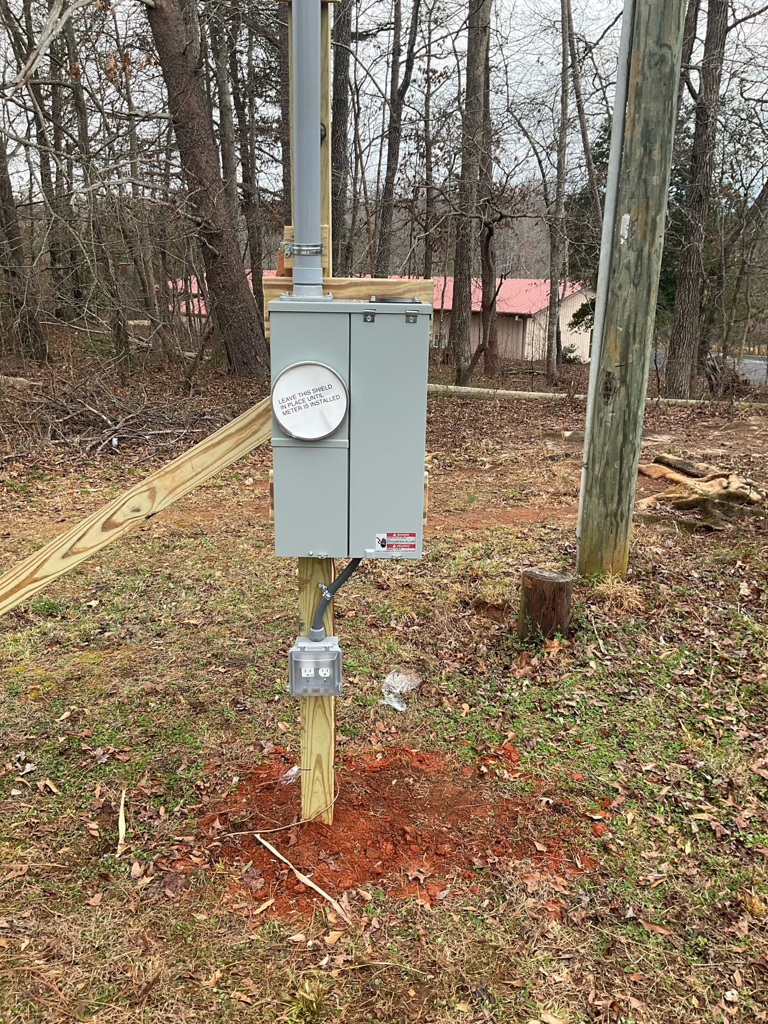 125A Meter Base, Panel & Temp Power Pole Install | Bostic, NC completed by Touchstone Electric