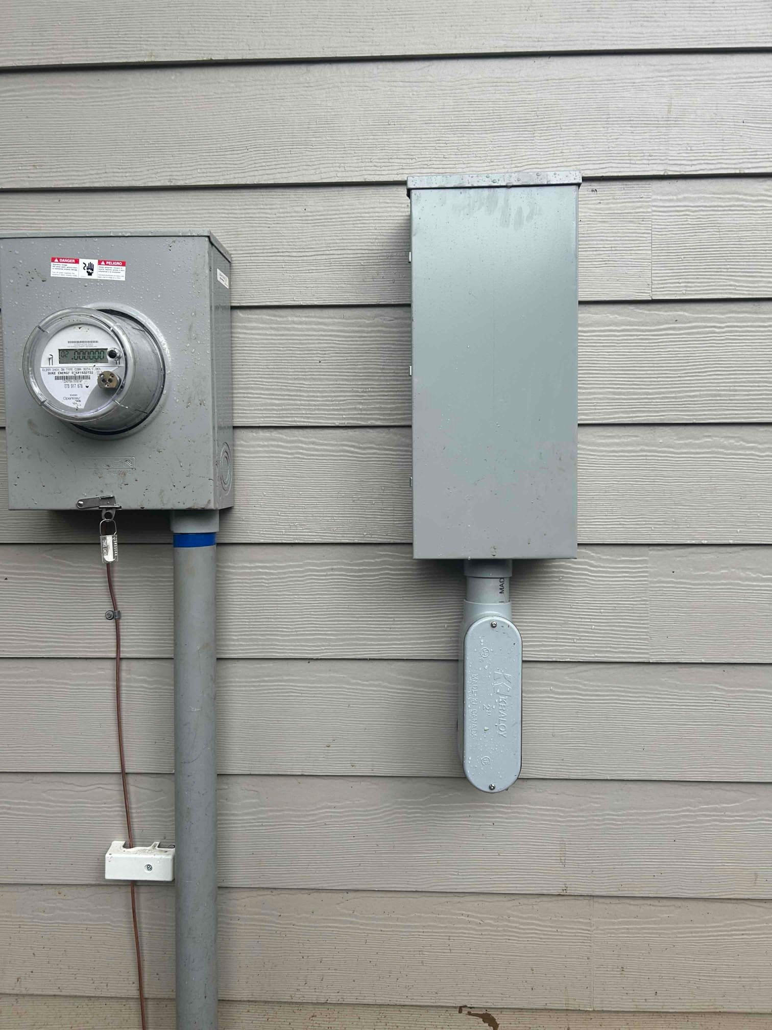 Charlotte Meter Base & 200A Service Replacement + Main Feeder completed by Touchstone Electric