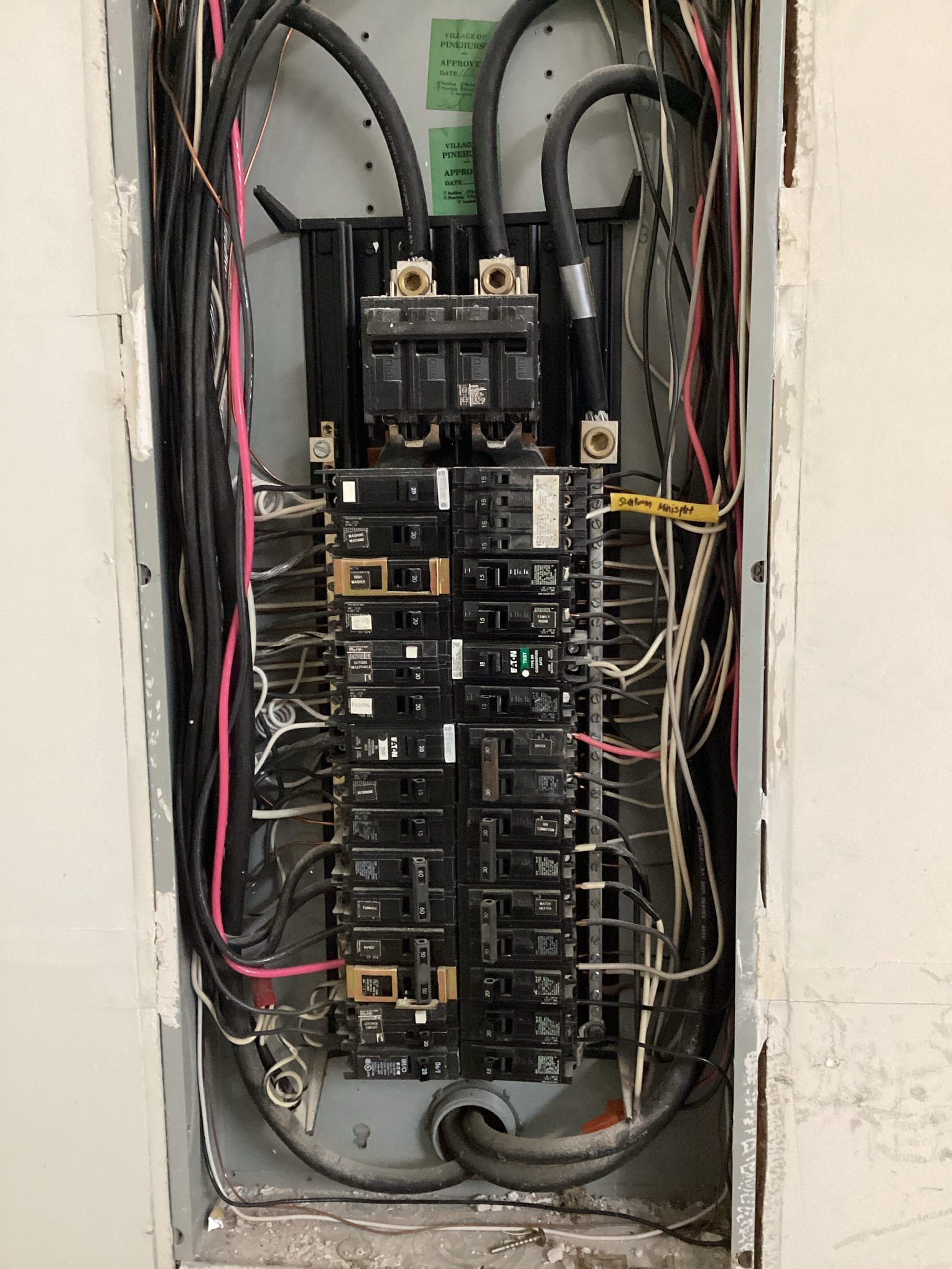 EV Charger Installation in Pinehurst, NC – Garage Panel Setup completed by Touchstone Electric