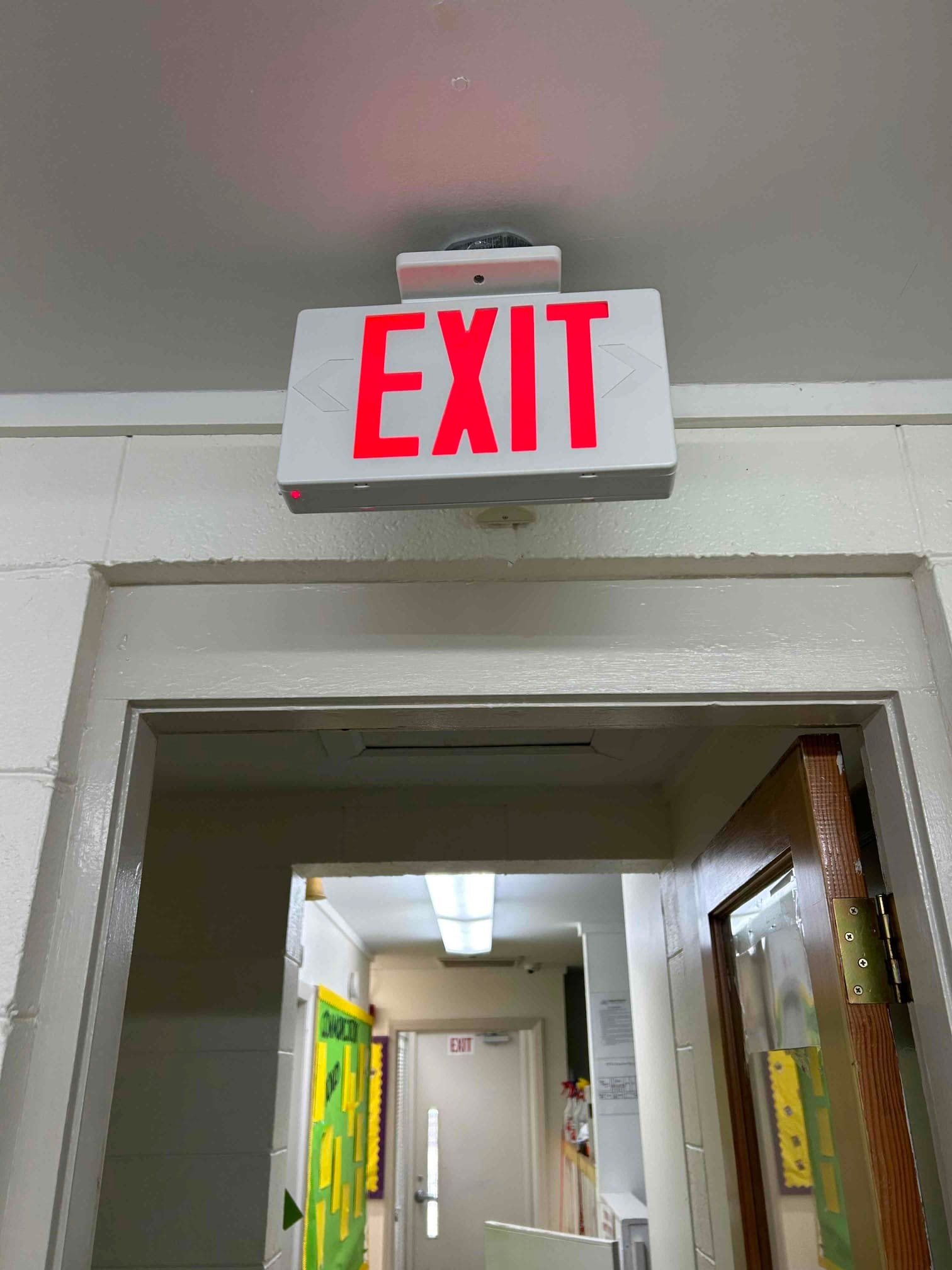 Exit Sign Installation & Hardwiring in Charlotte, NC completed by Touchstone Electric