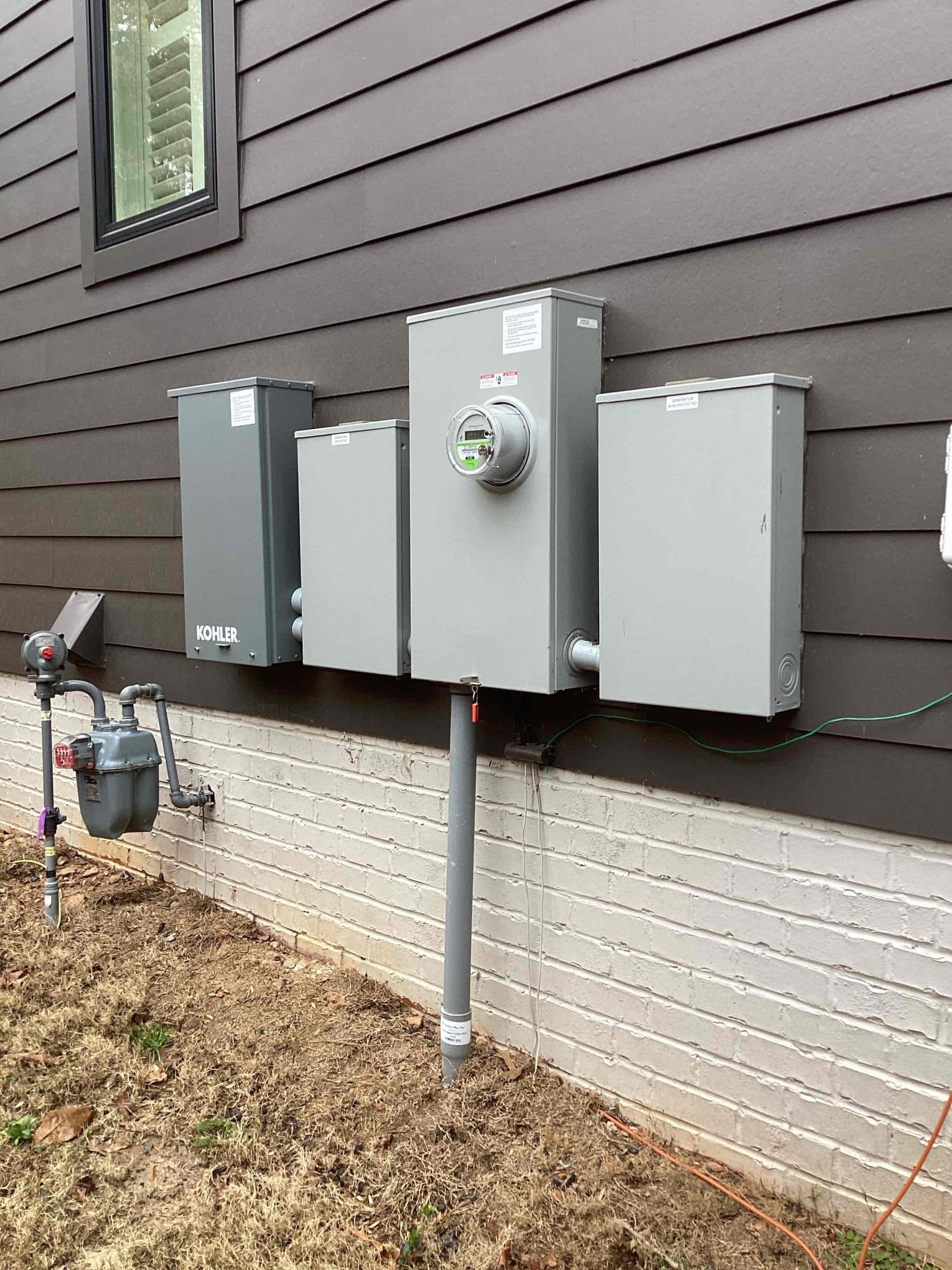 Raleigh Outlet Installation: GFCI, Patio Receptacles & Smart Dimmer completed by Touchstone Electric
