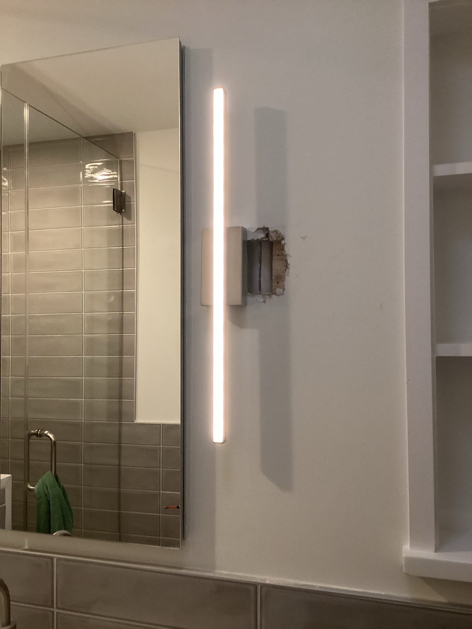 Bathroom Light Fixture Installation & Relocation in Charlotte, NC completed by Touchstone Electric
