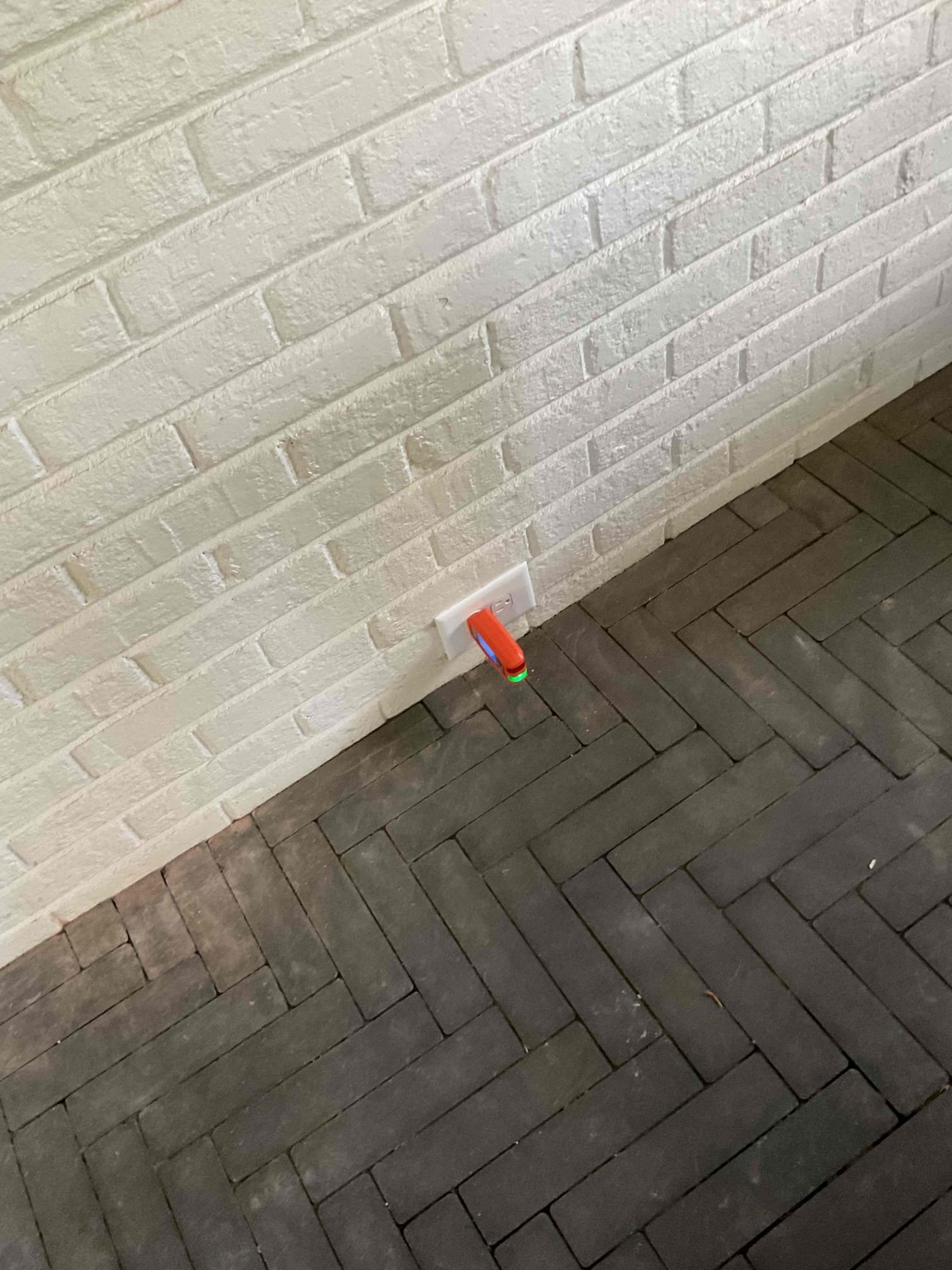 Brick Wall Flush-Mount Quadplex Outlet Install in Charlotte, NC completed by Touchstone Electric