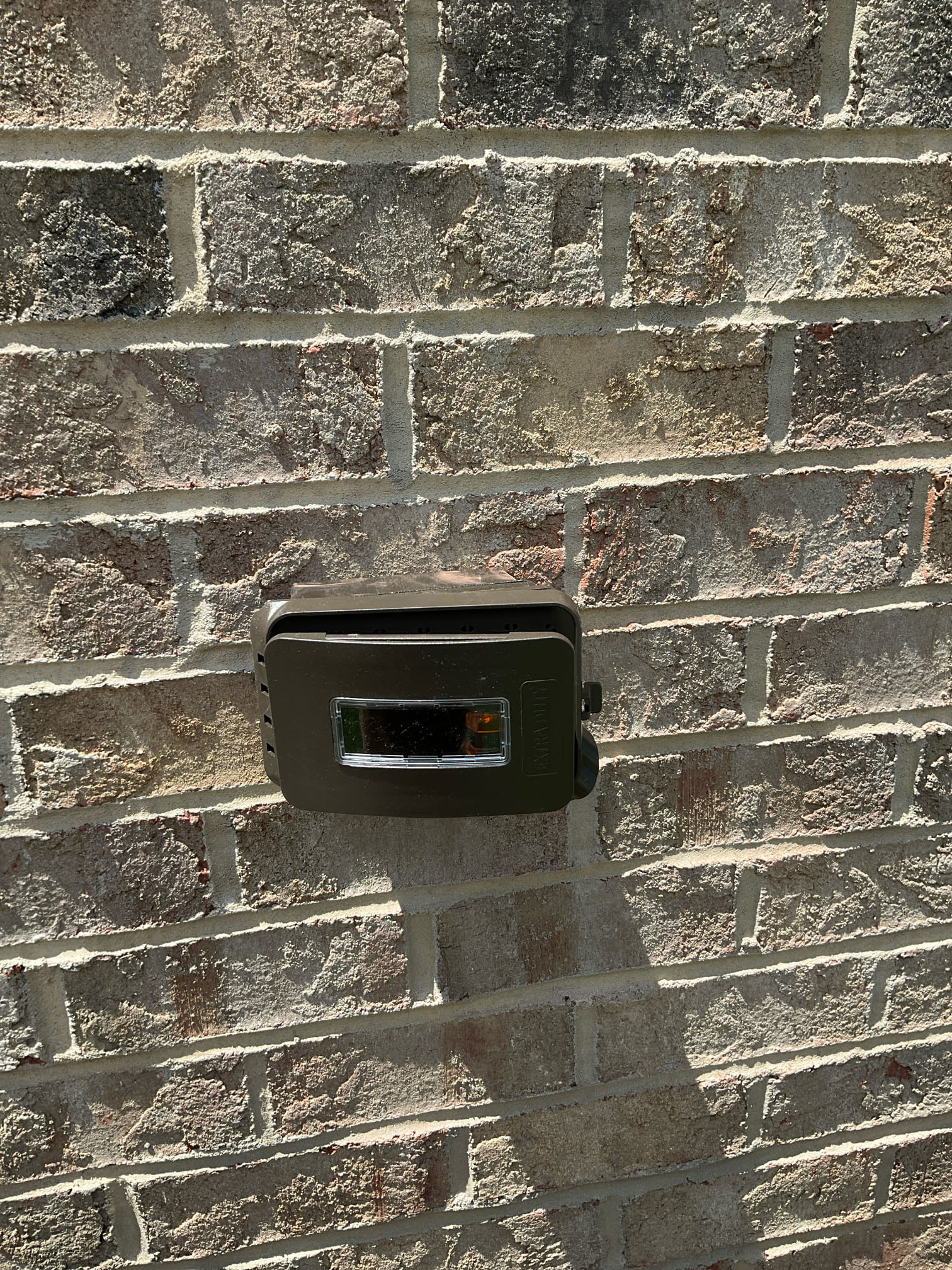 Weatherproof Outdoor GFCI Outlet Installation in Huntersville, NC completed by Touchstone Electric