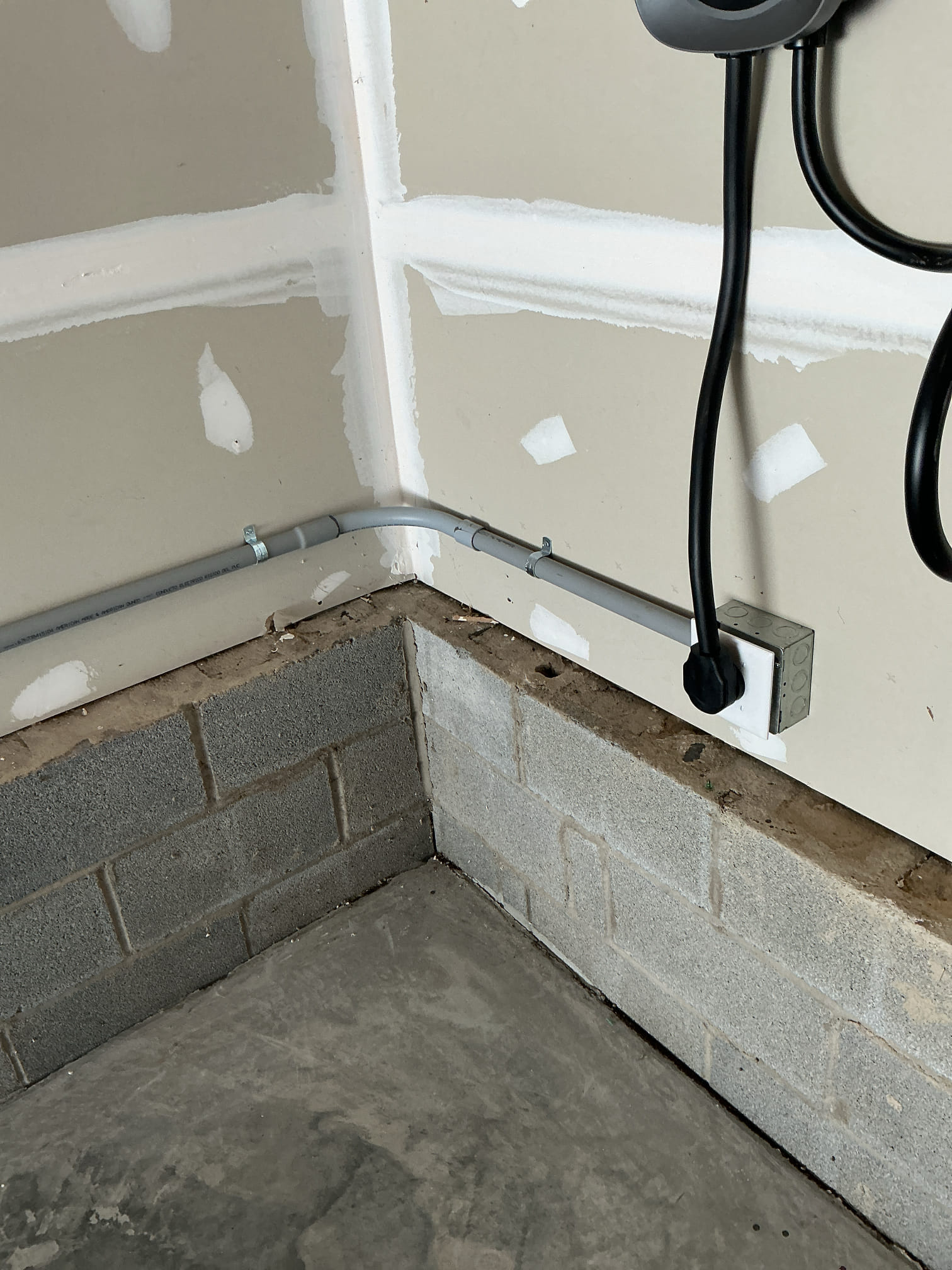 Tesla Wall Connector EV Charger Installation in Charlotte, NC completed by Touchstone Electric