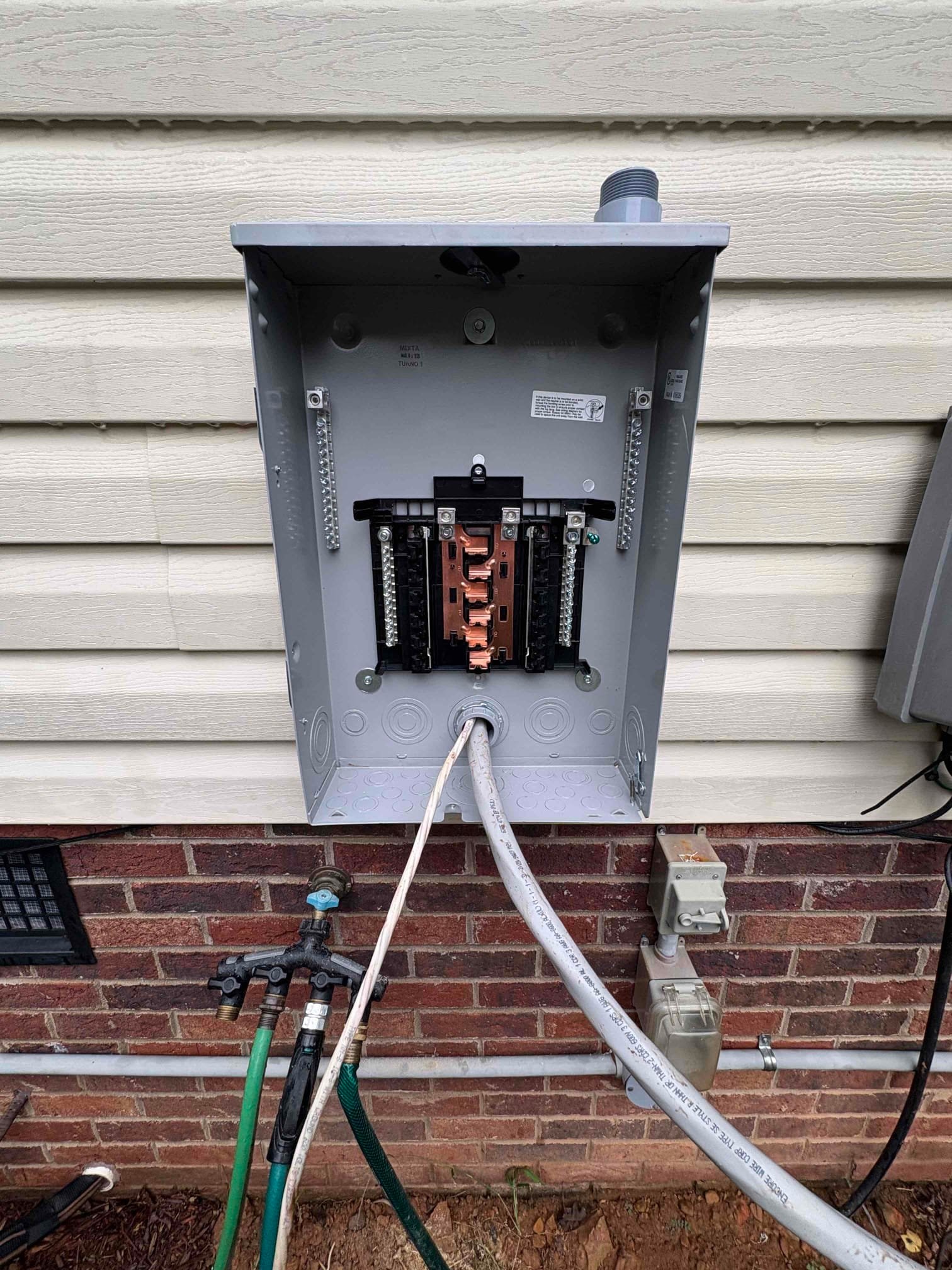 Outdoor Subpanel Installation with 100A Feeder in Albemarle, NC completed by Touchstone Electric