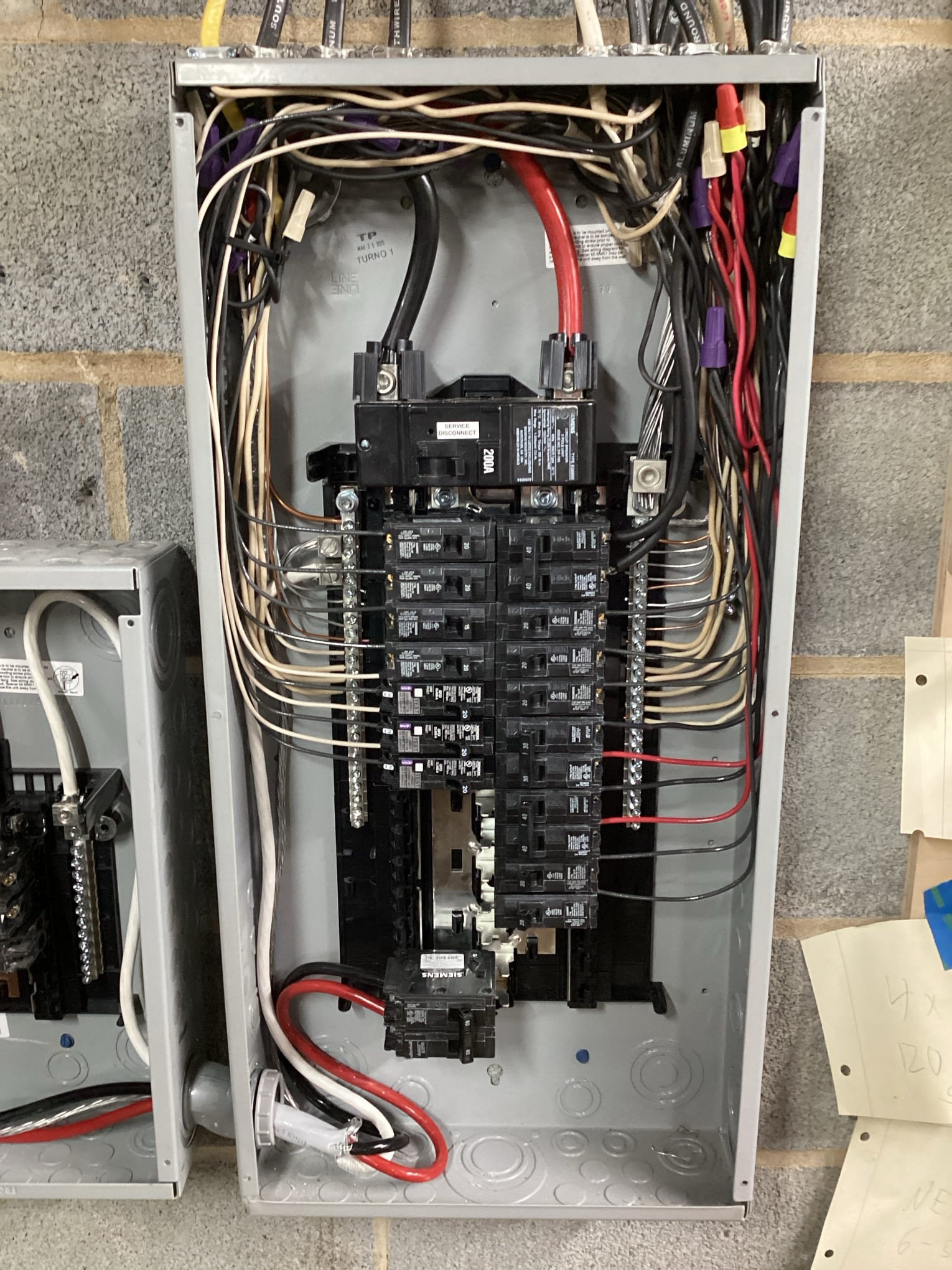 200A Panel Upgrade, Meter Base Replacement & Subpanel - Raleigh, NC completed by Touchstone Electric