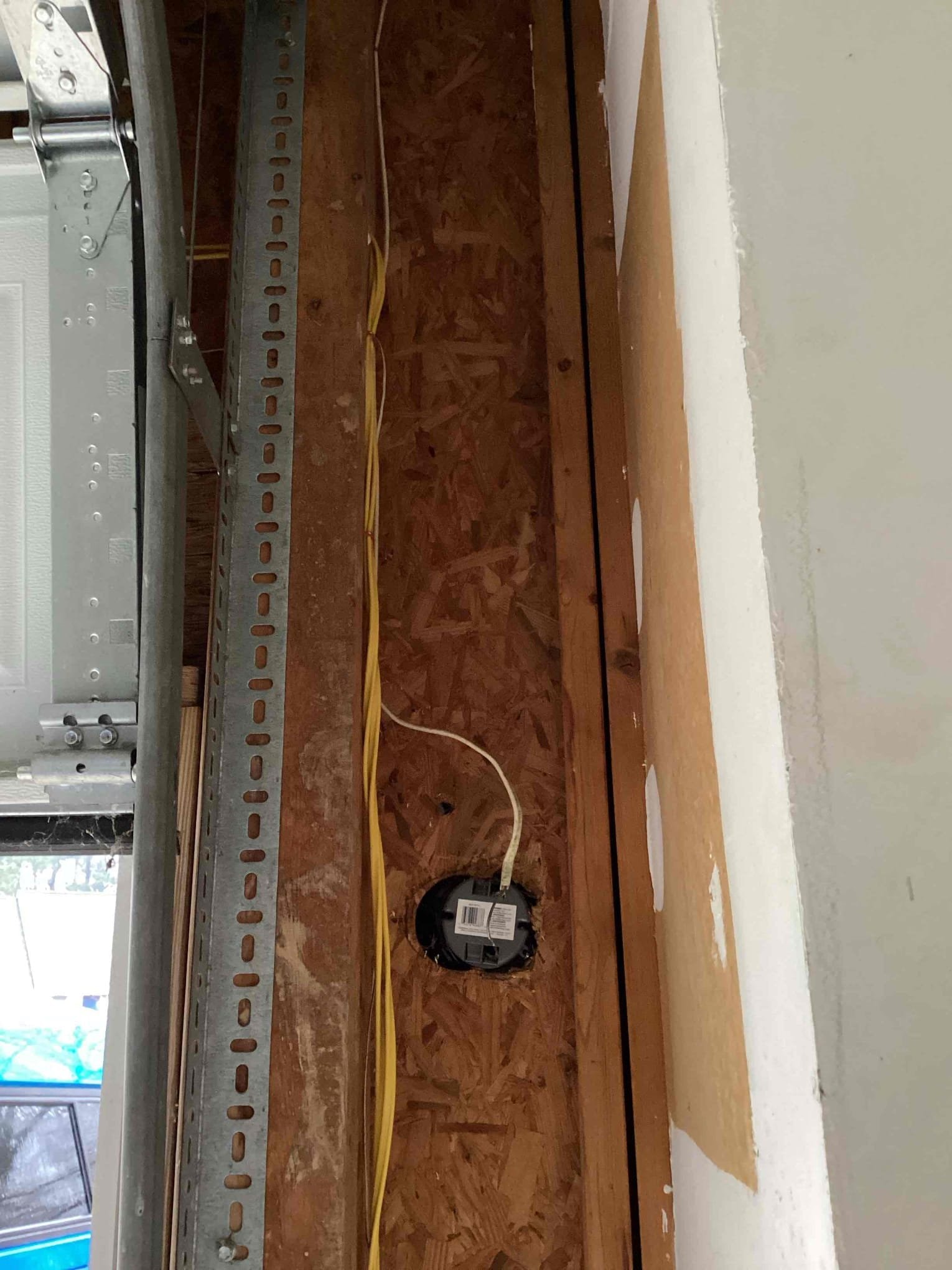 Garage Wiring & 20-Amp Outlet Circuit Run in Morrisville, NC completed by Touchstone Electric