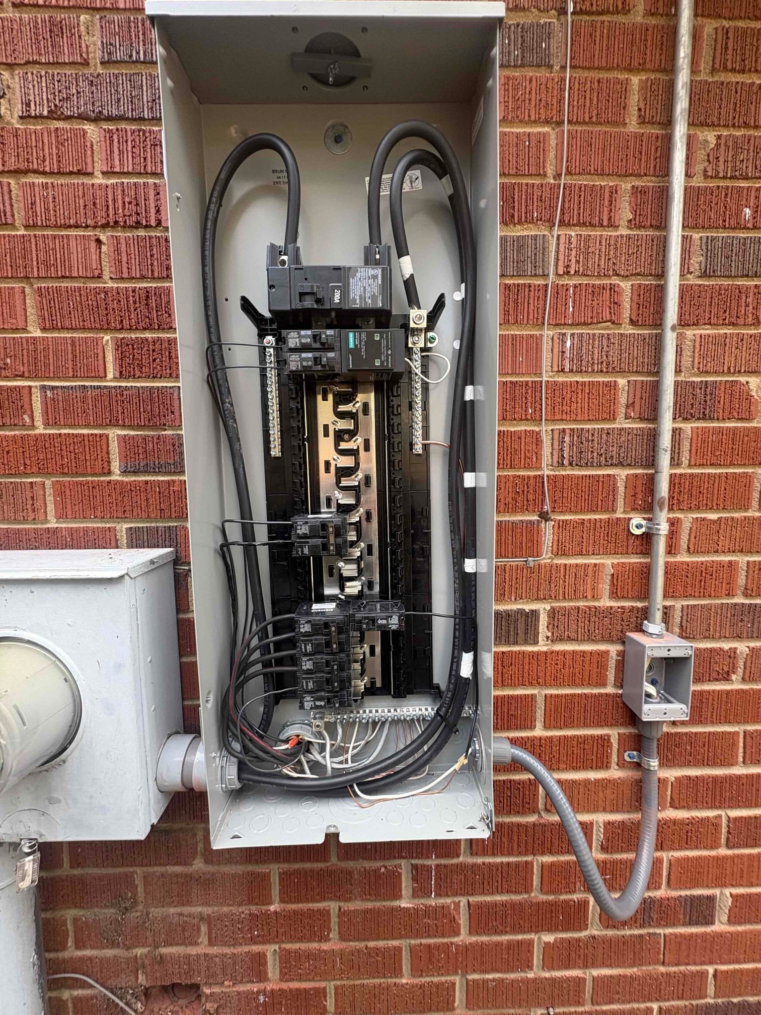 200A Electrical Panel Upgrade & Breaker Replacement in Charlotte completed by Touchstone Electric