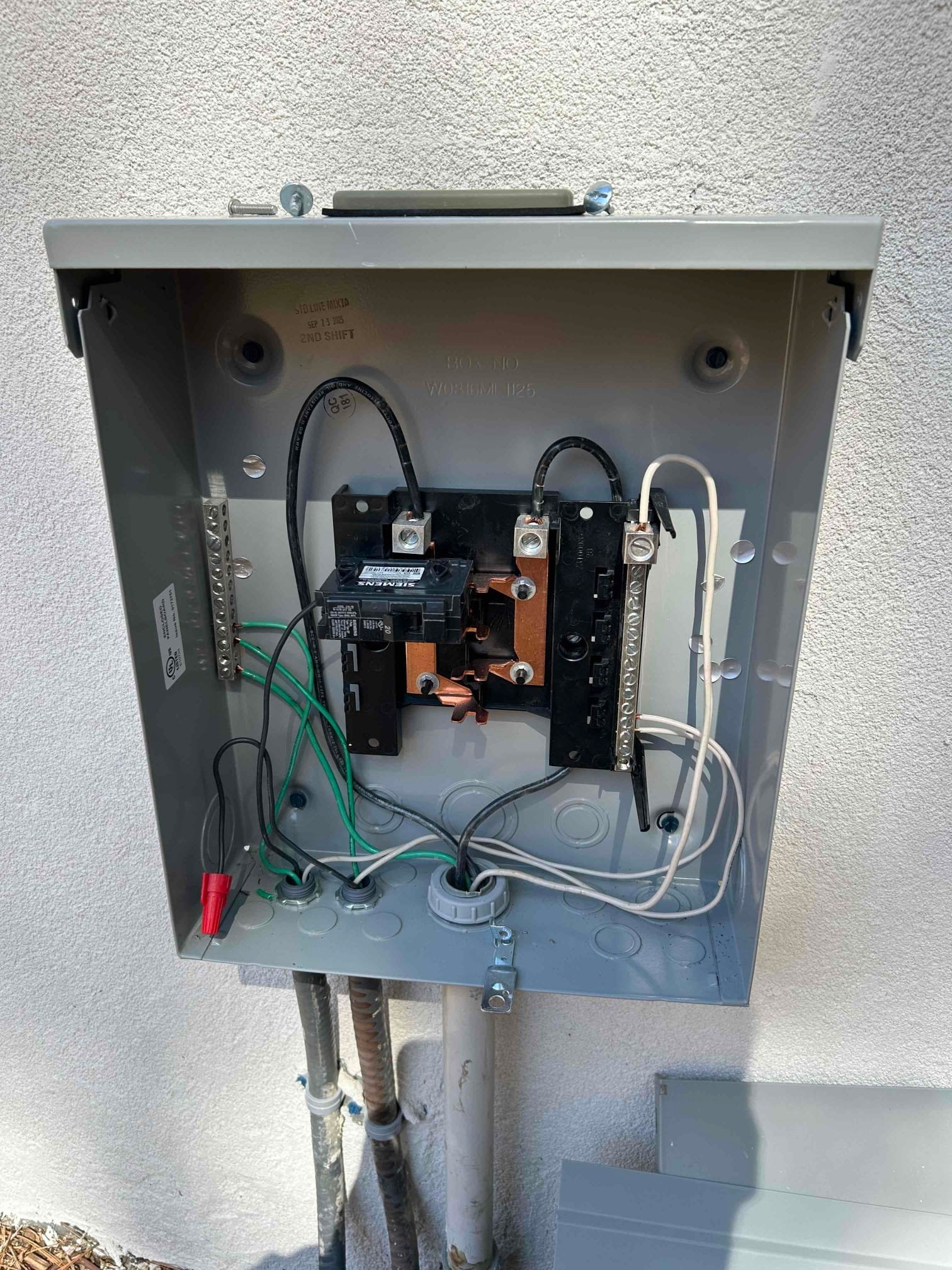 Outdoor GFCI Outlet Installation by Gate in Charlotte, NC completed by Touchstone Electric