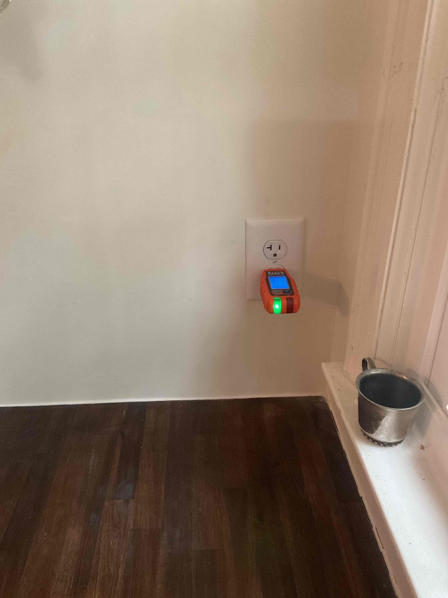 Interior outlet testing during a Durham electrical service visit