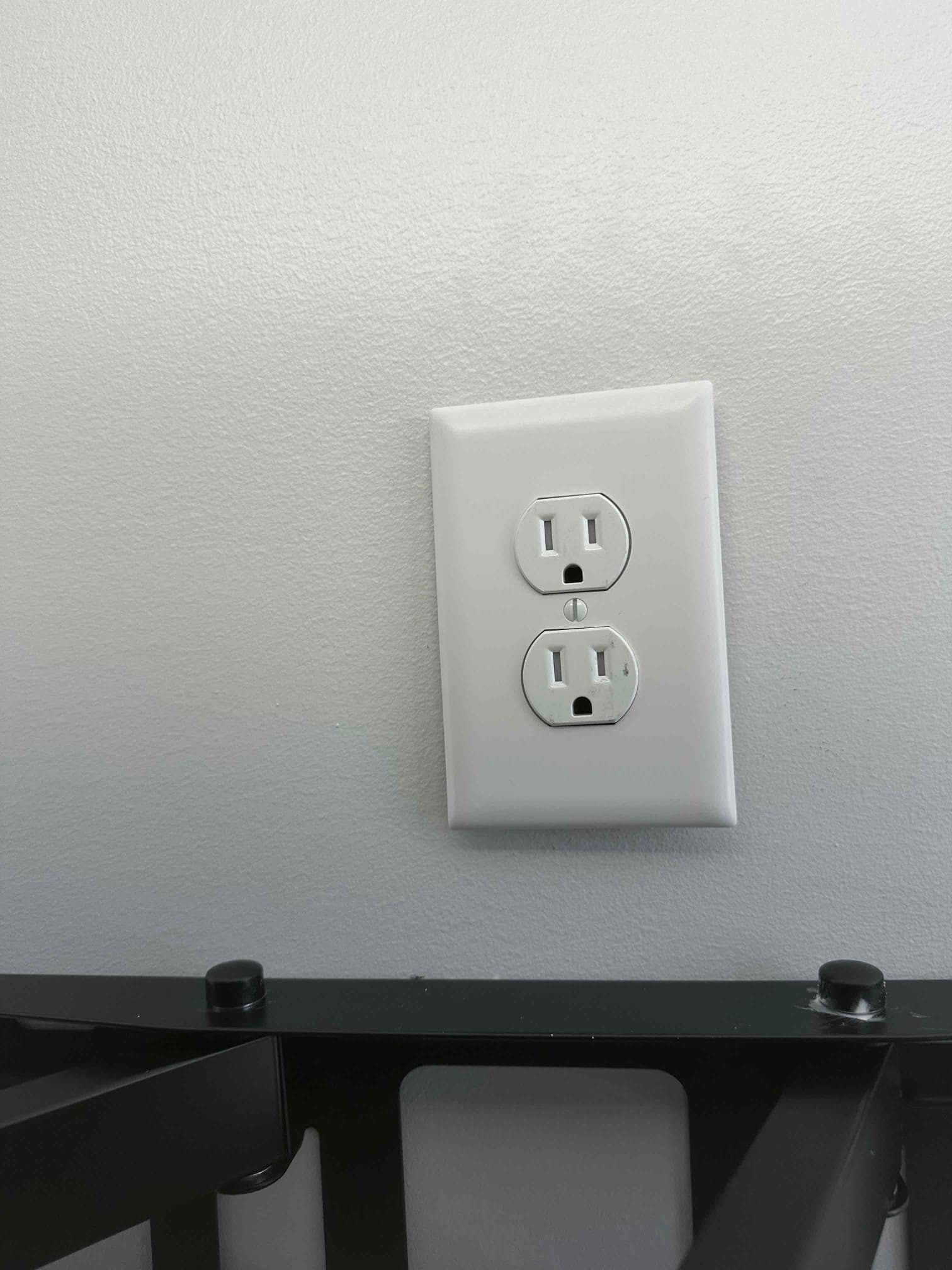 Outlet Installation Behind Wall-Mounted TV in Charlotte, NC