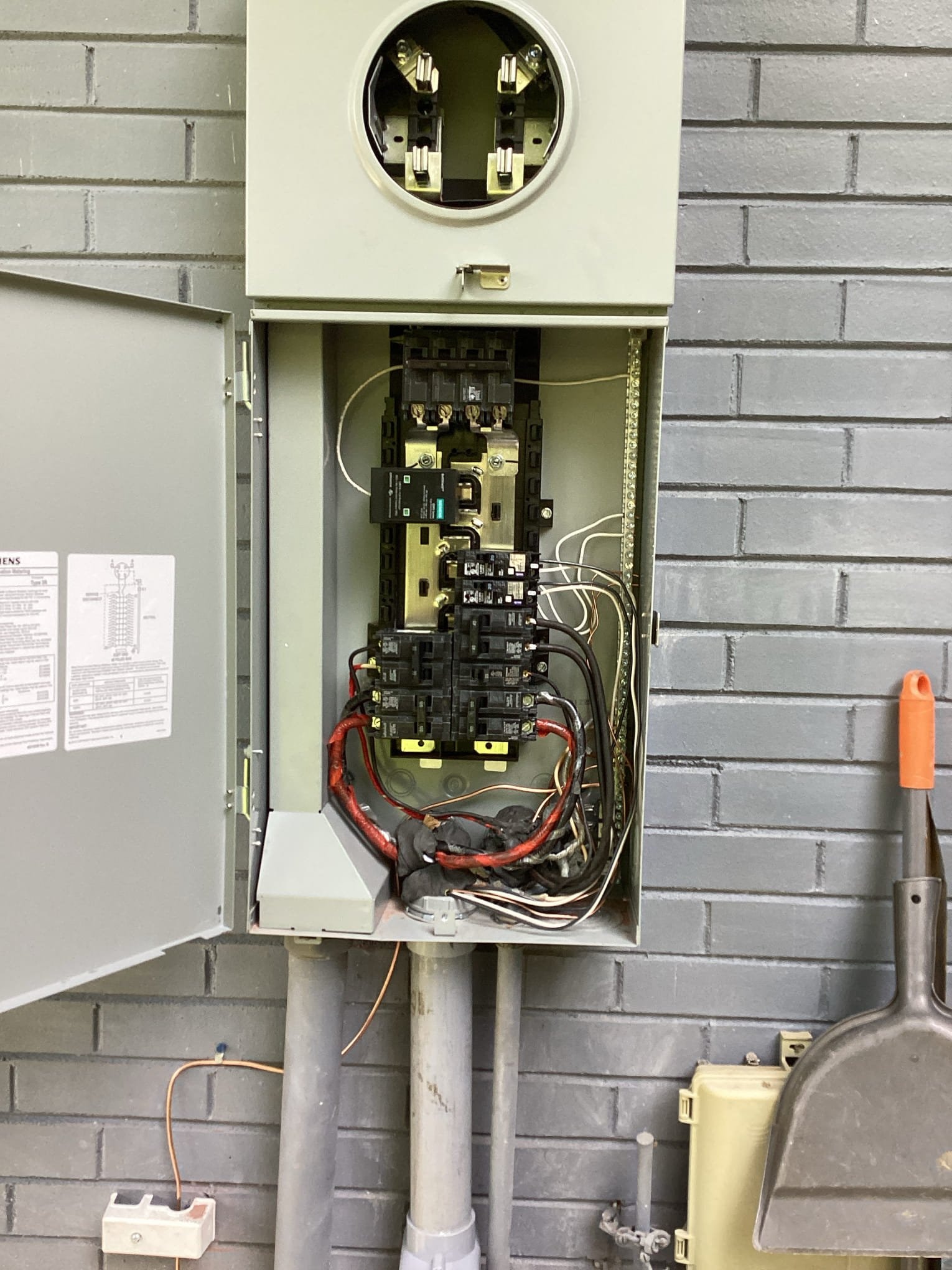 Meter Base Replacement & 200A Panel Upgrade in Durham, NC completed by Touchstone Electric