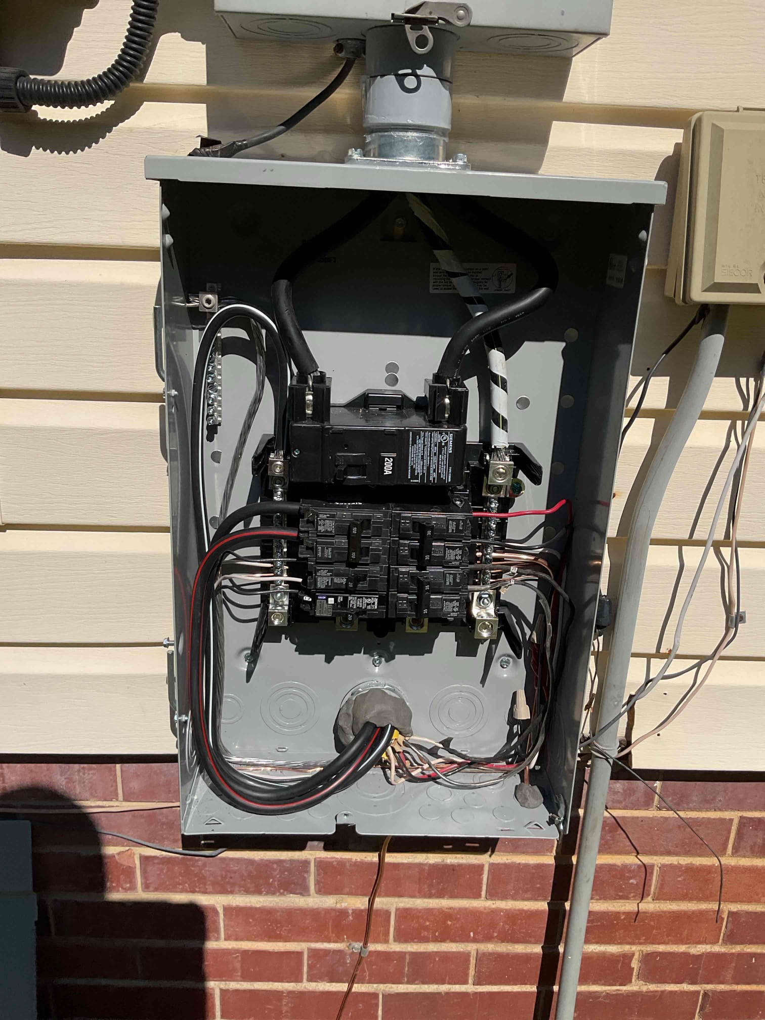200-Amp Electrical Panel Upgrade & Subpanel Safety in Wadesboro completed by Touchstone Electric