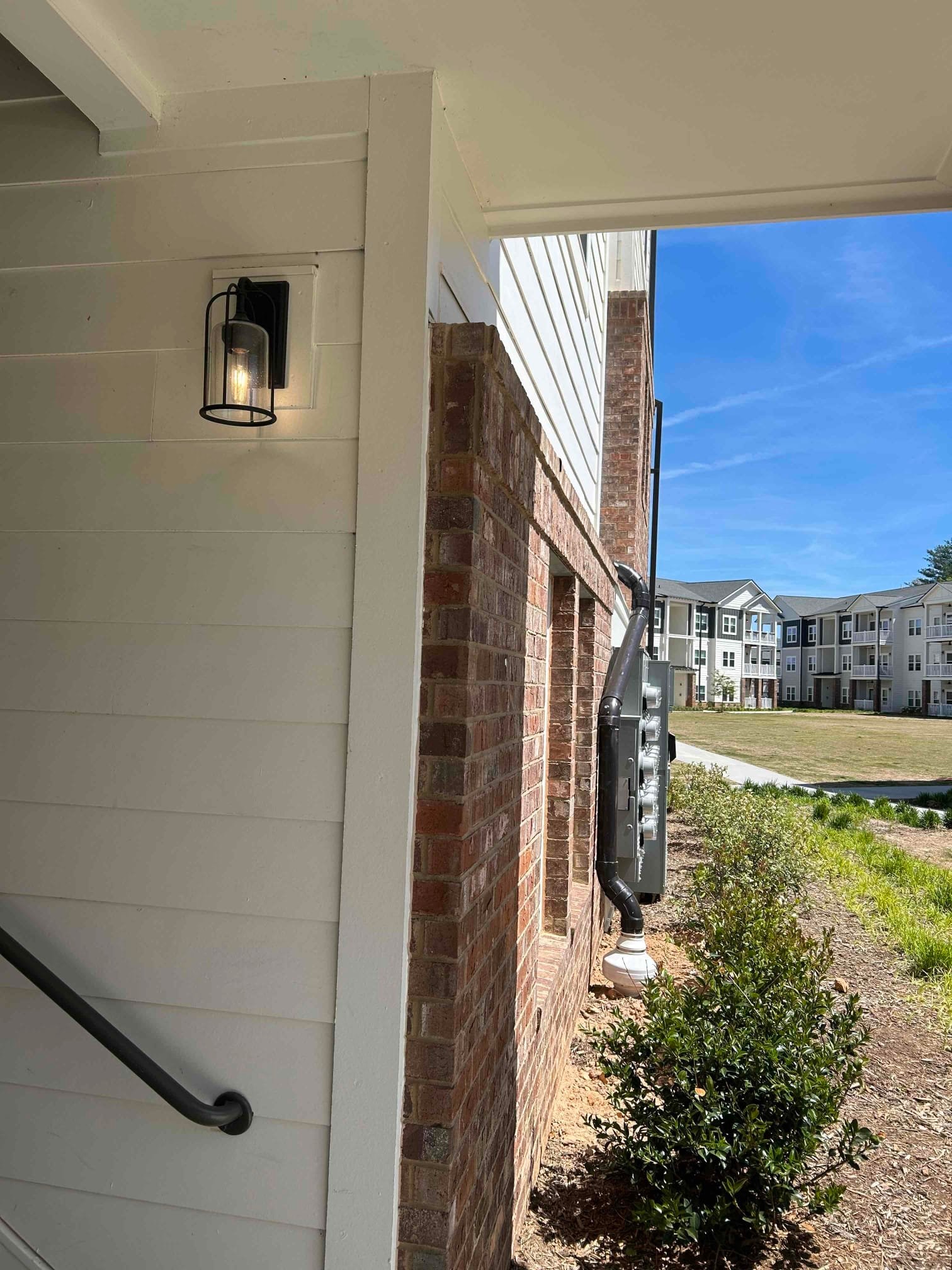 Exterior outlet installation on a Flat Rock NC home by Touchstone Electric