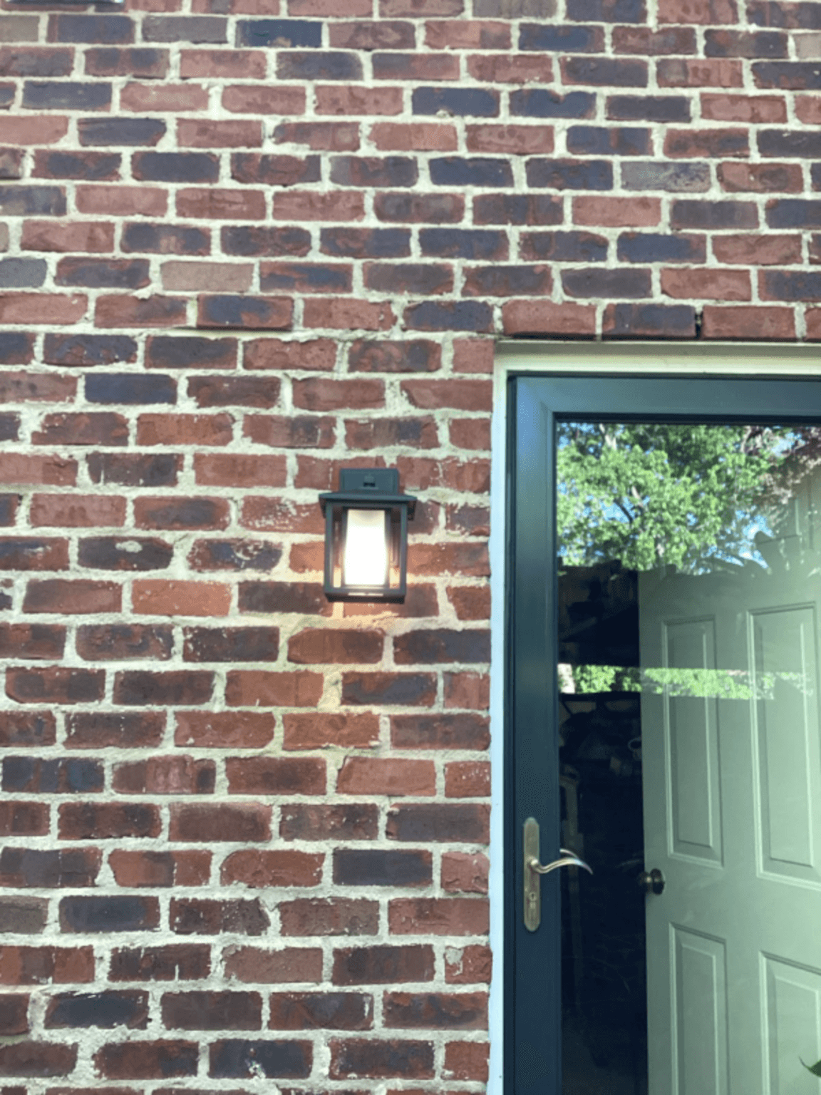 Indoor LED lighting fixture checked during lighting repair planning