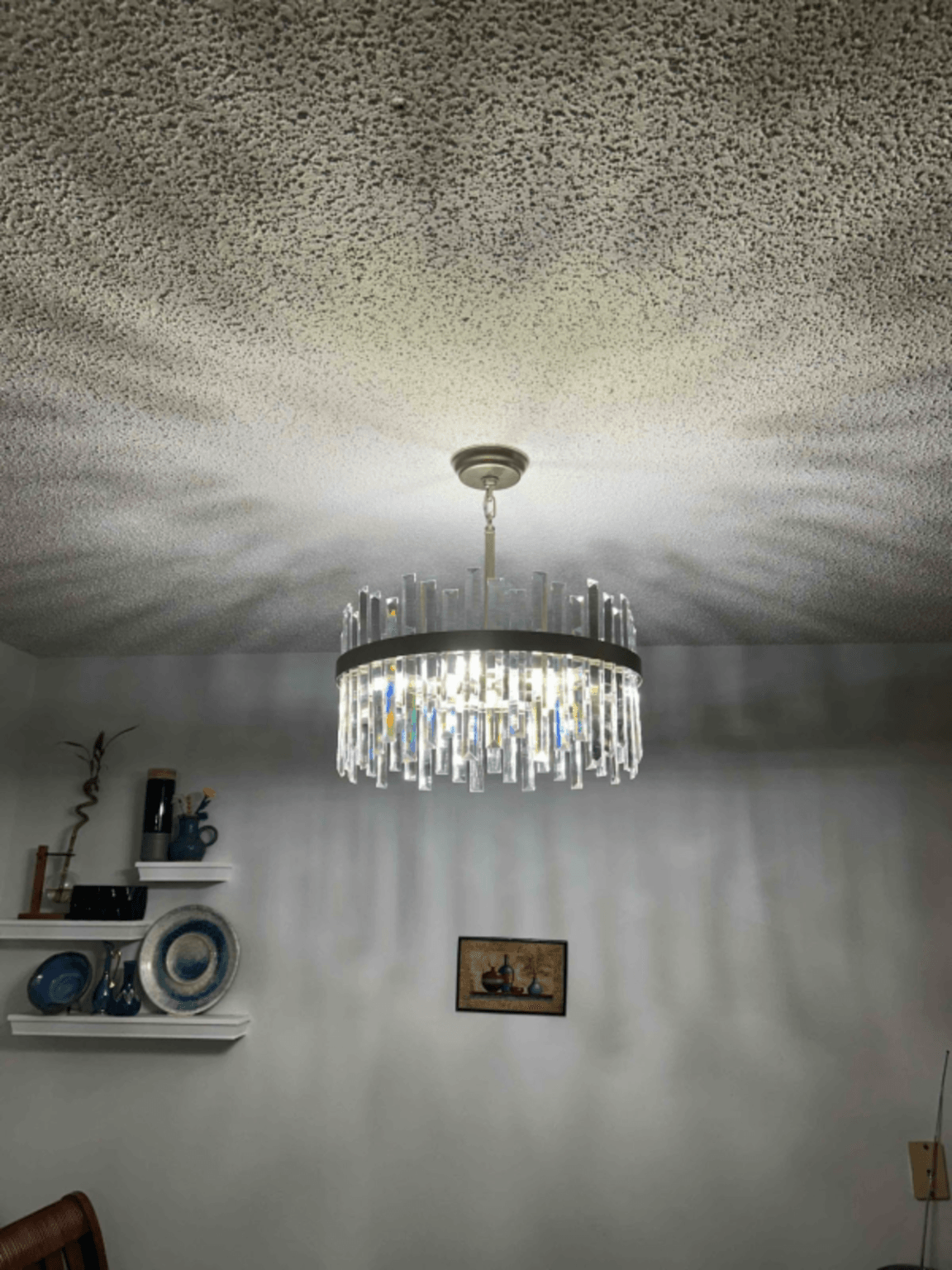 Chandelier fixture installation with residential lighting wiring