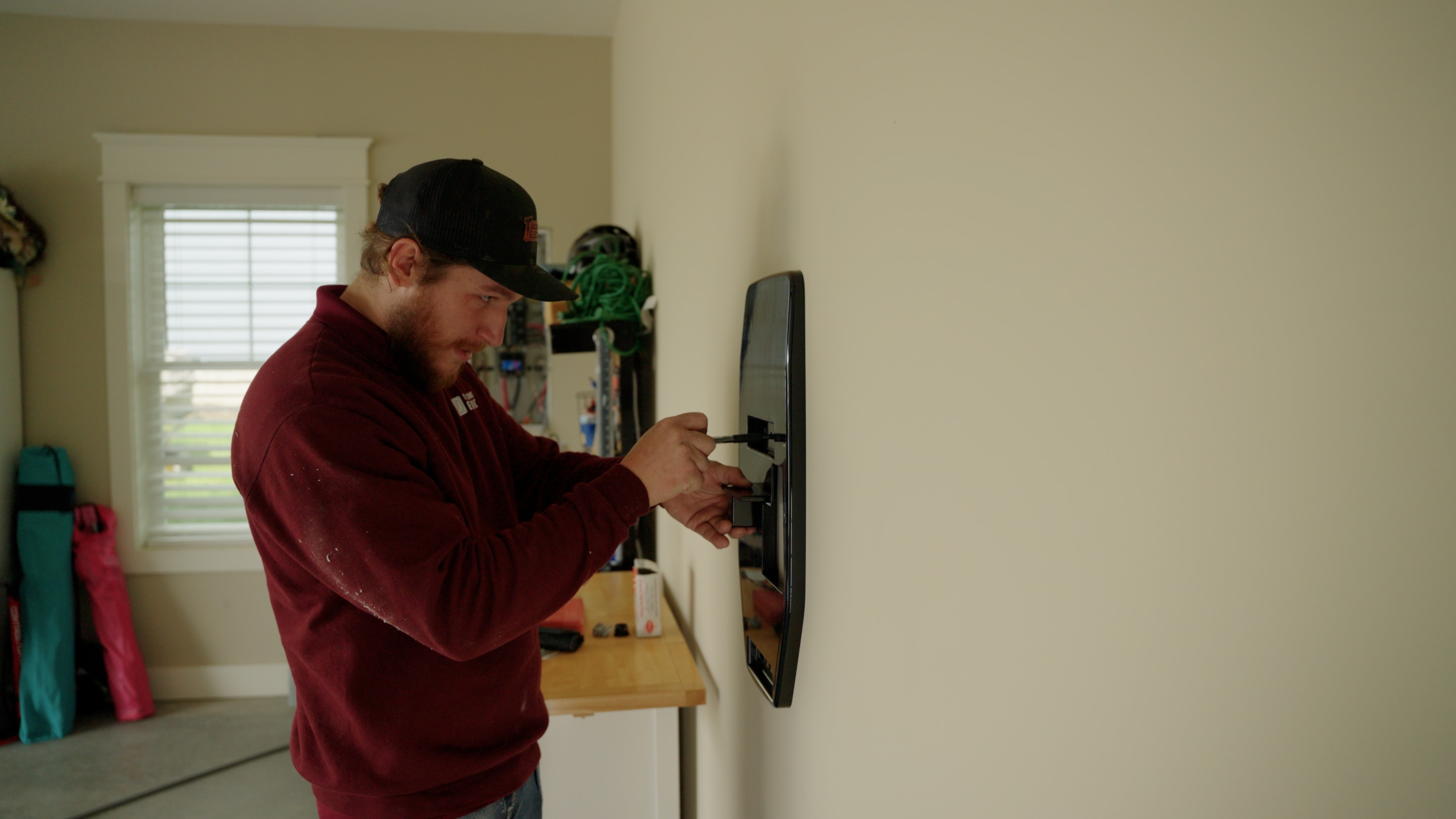 Electrician assessing electrical capacity for EV charger