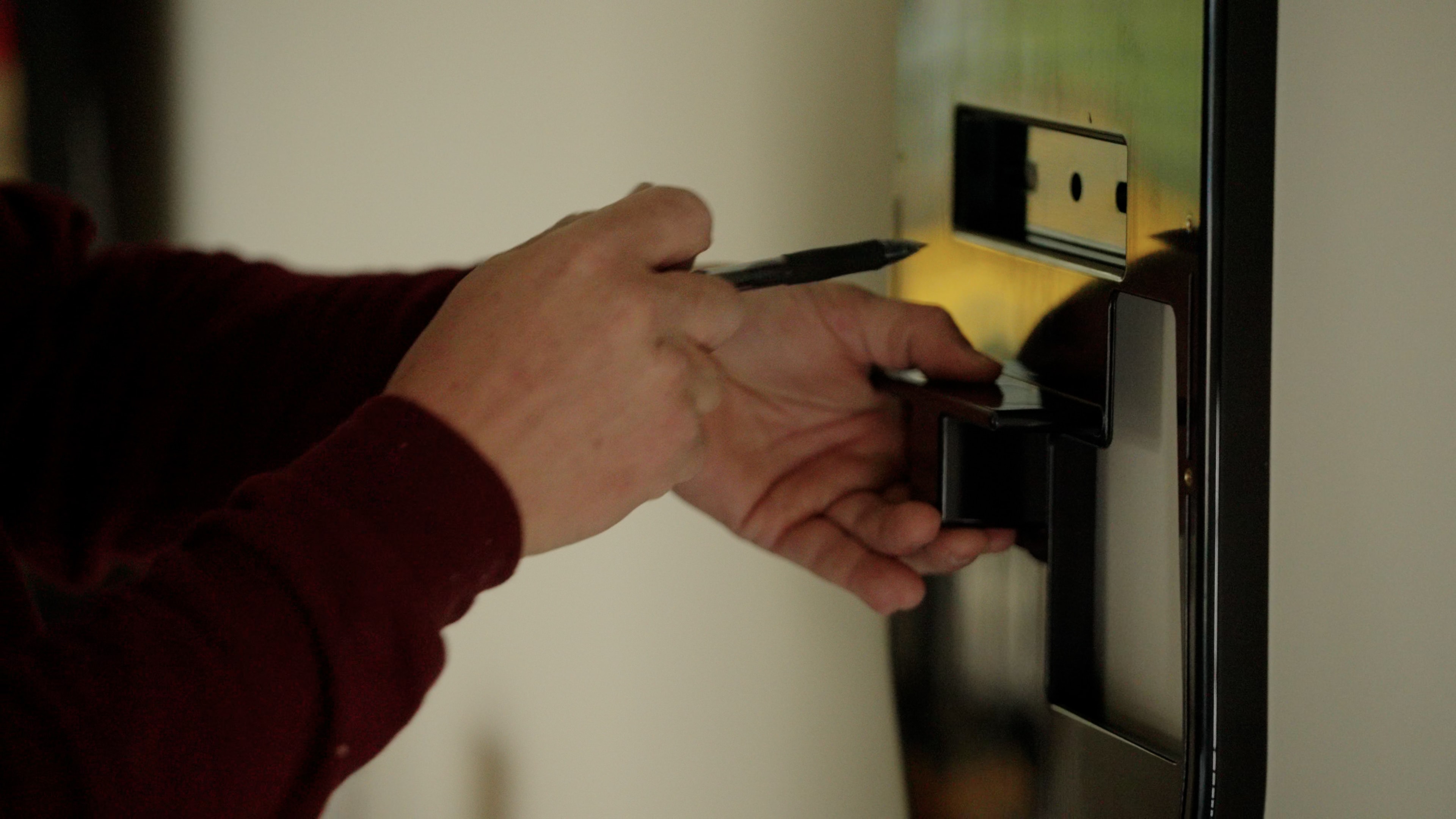 Touchstone Electric technician installing an EV charger