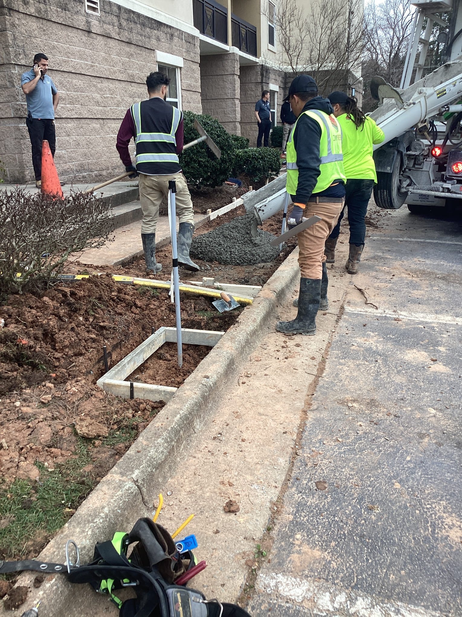 Electrician assessing electrical needs for tesla wall connector installation