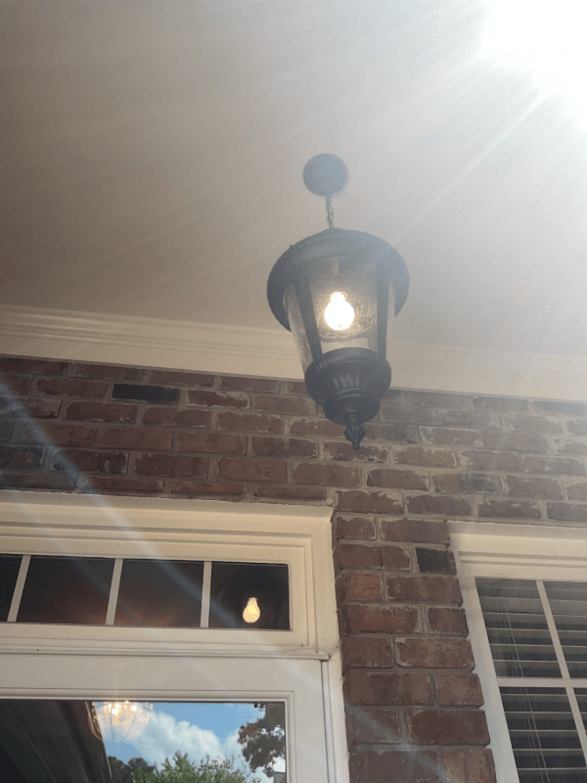 Interior light fixture installation work with wiring and fixture placement