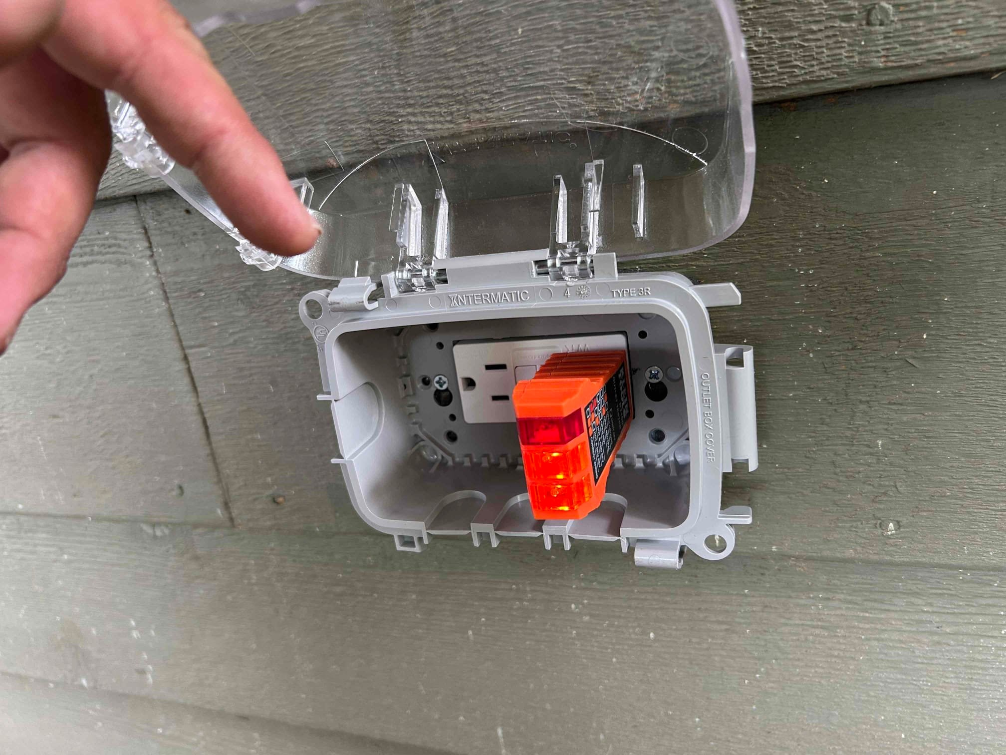 Electrician assessing electrical needs for ceiling fan installation