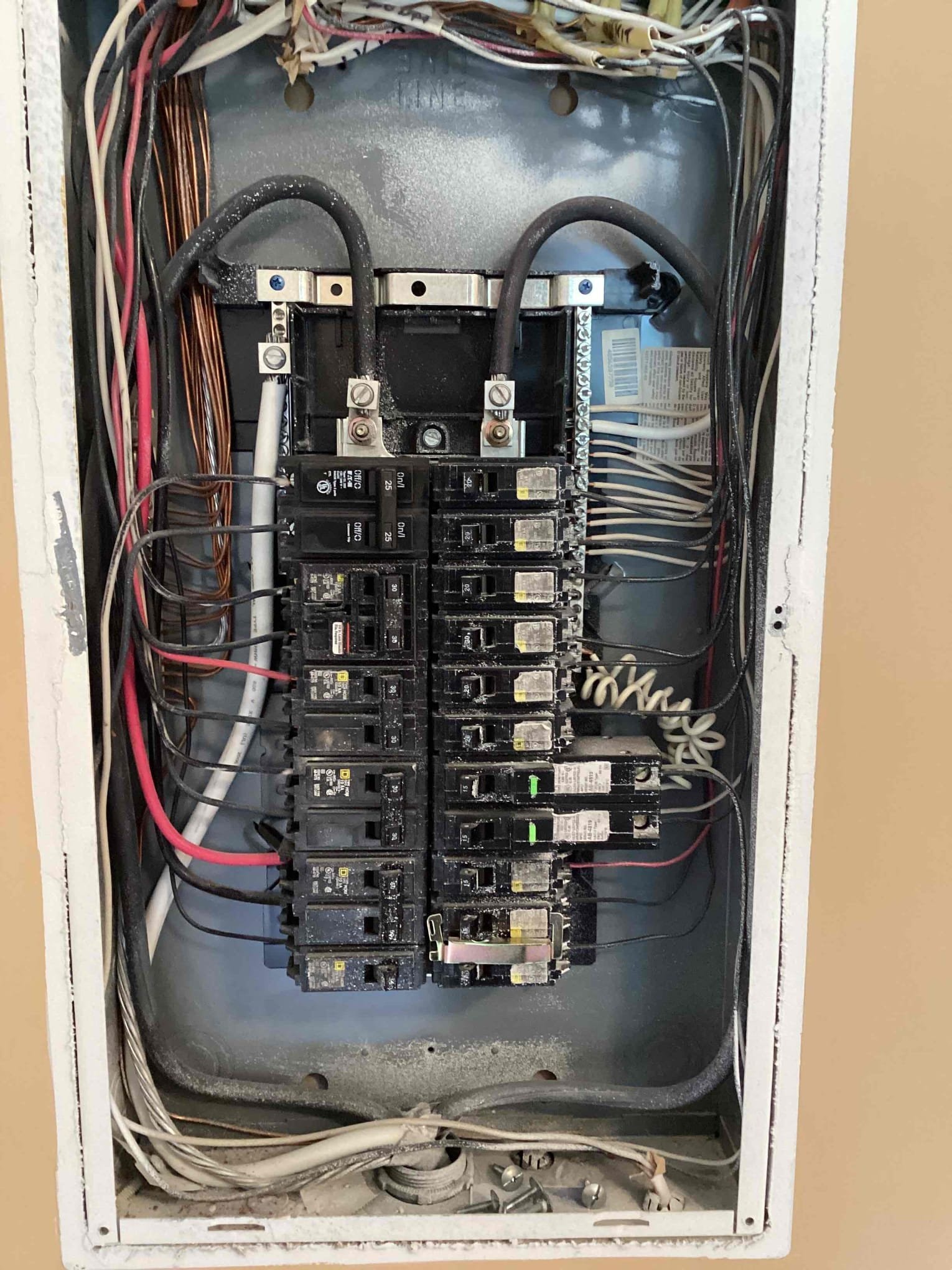 Electrician assessing electrical needs for lighting installation