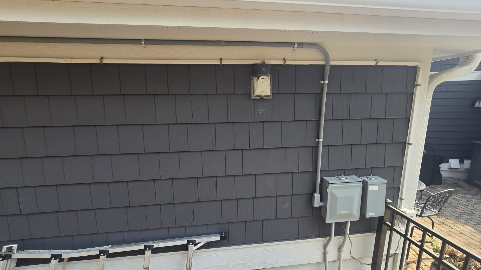 Touchstone Electric electrician wiring a residential subpanel