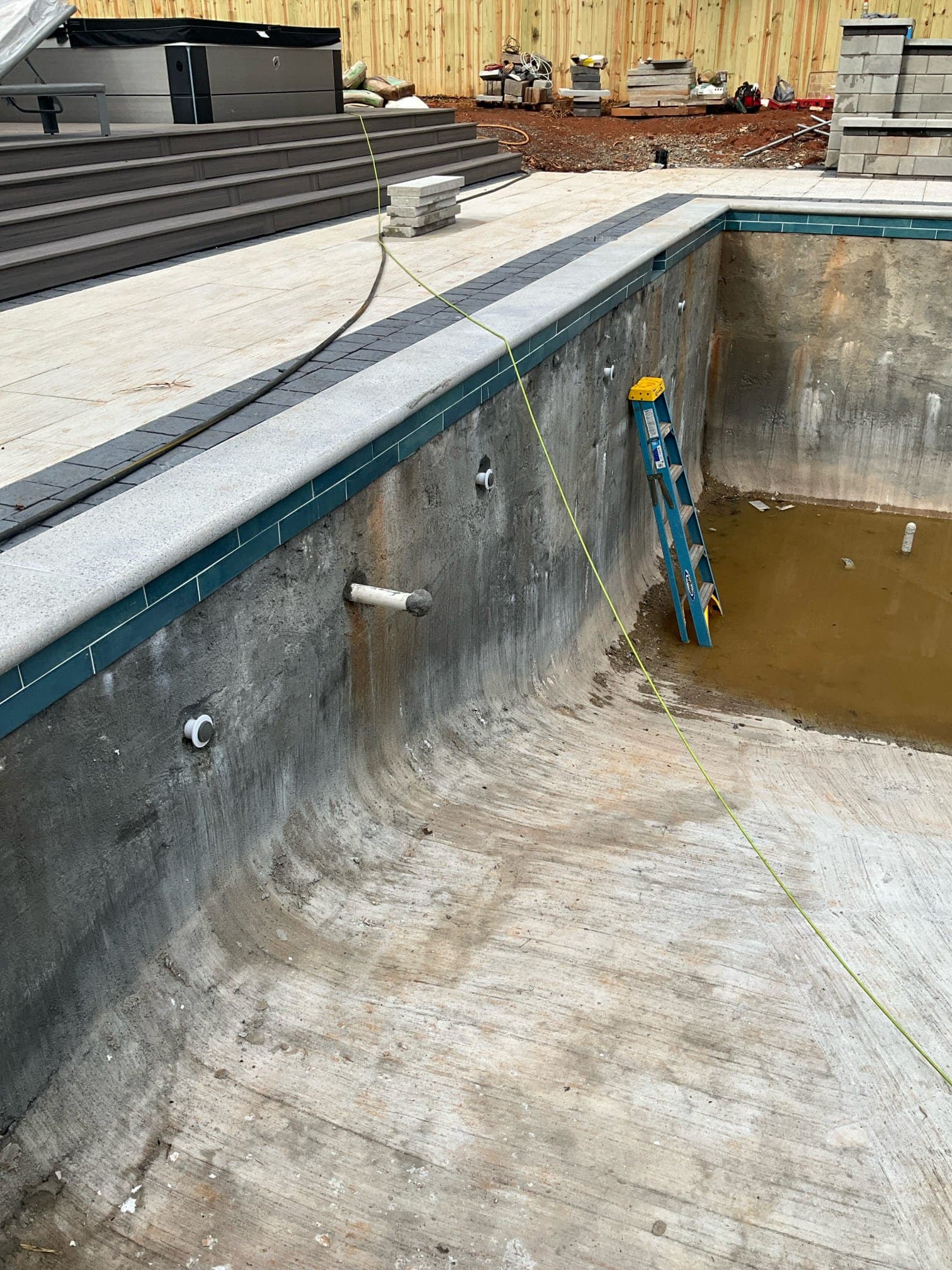 Electrician assessing electrical needs for pool electrician