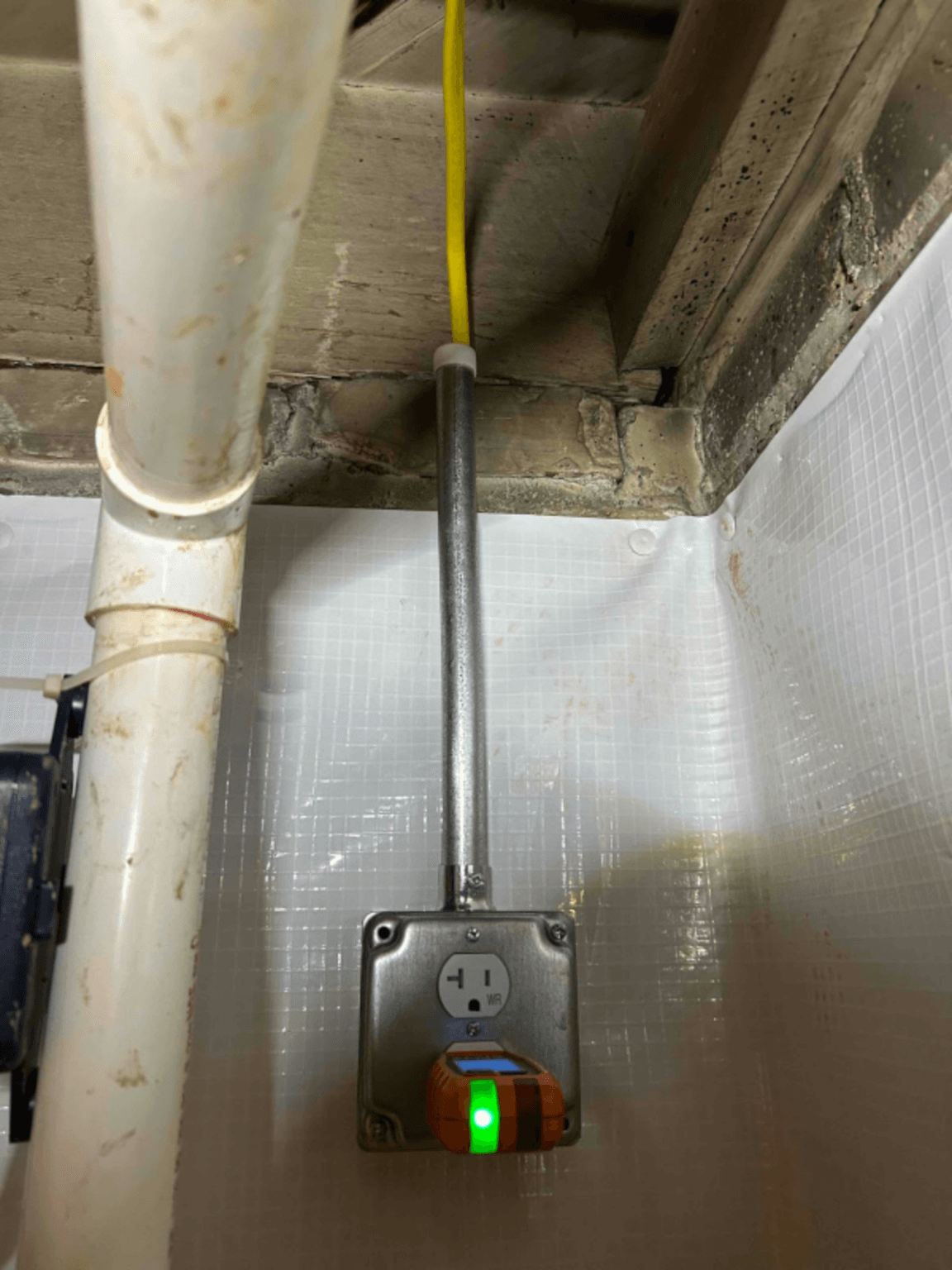 Outlet installation for basement moisture-control equipment