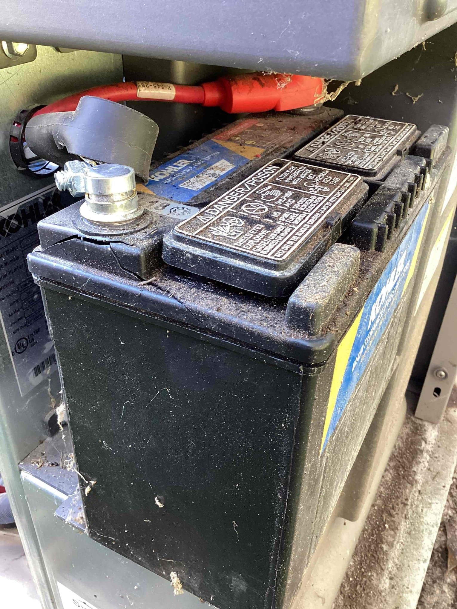 Electrician assessing electrical needs for whole-home generator maintenance
