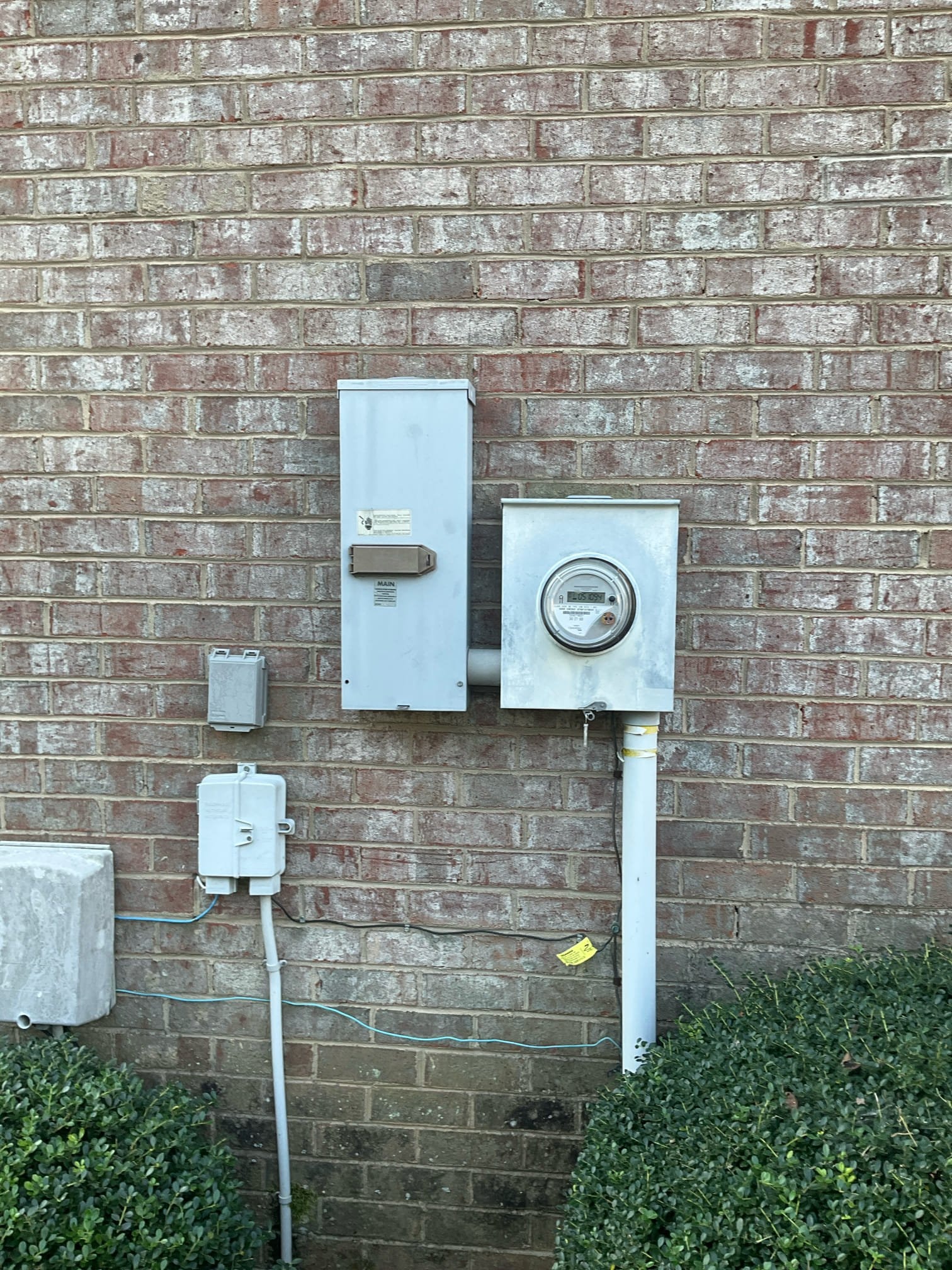 Electrician assessing electrical needs for whole-home generator maintenance