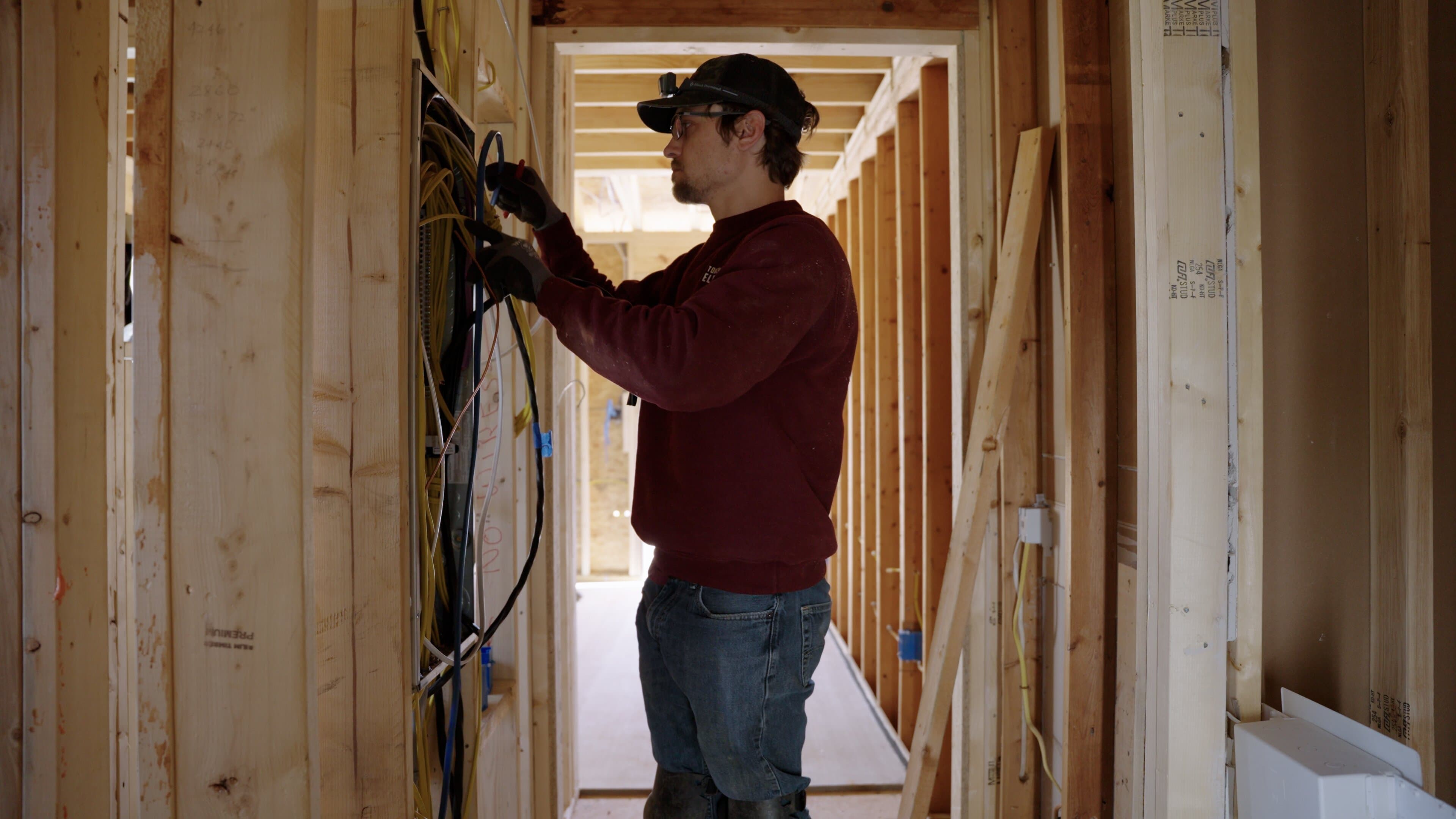 Electrician planning whole-home rewiring work